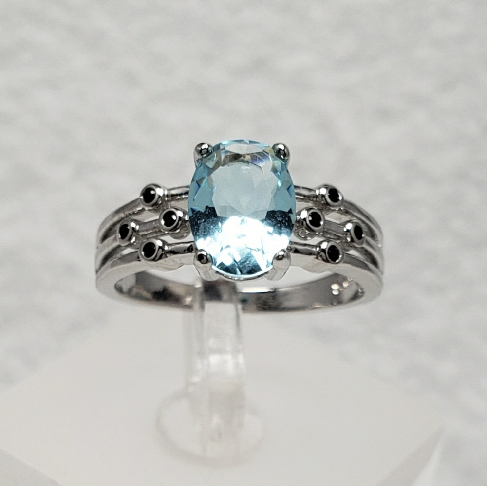 Topaz And Bezel Set Spinel Ring